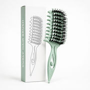 The Curl Defining Hair Brush.